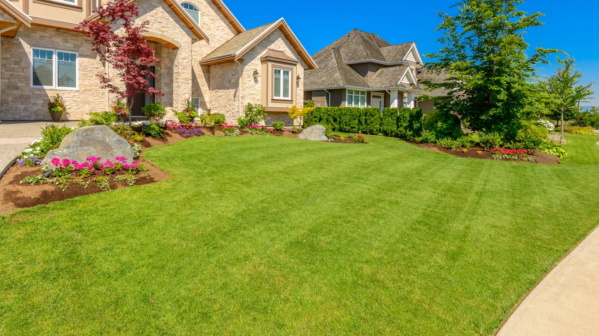 Healthy green lawn and beautiful landscaping at a home in Wilmington, DE.